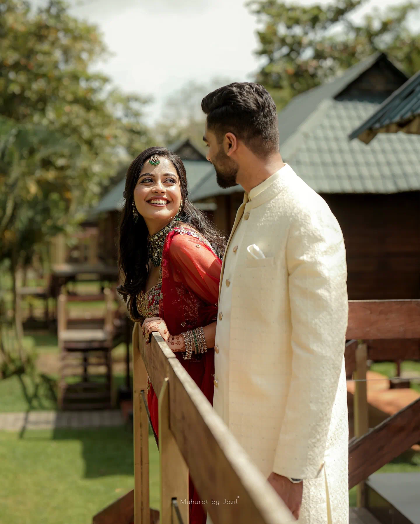 A newlywed couple smiling together
